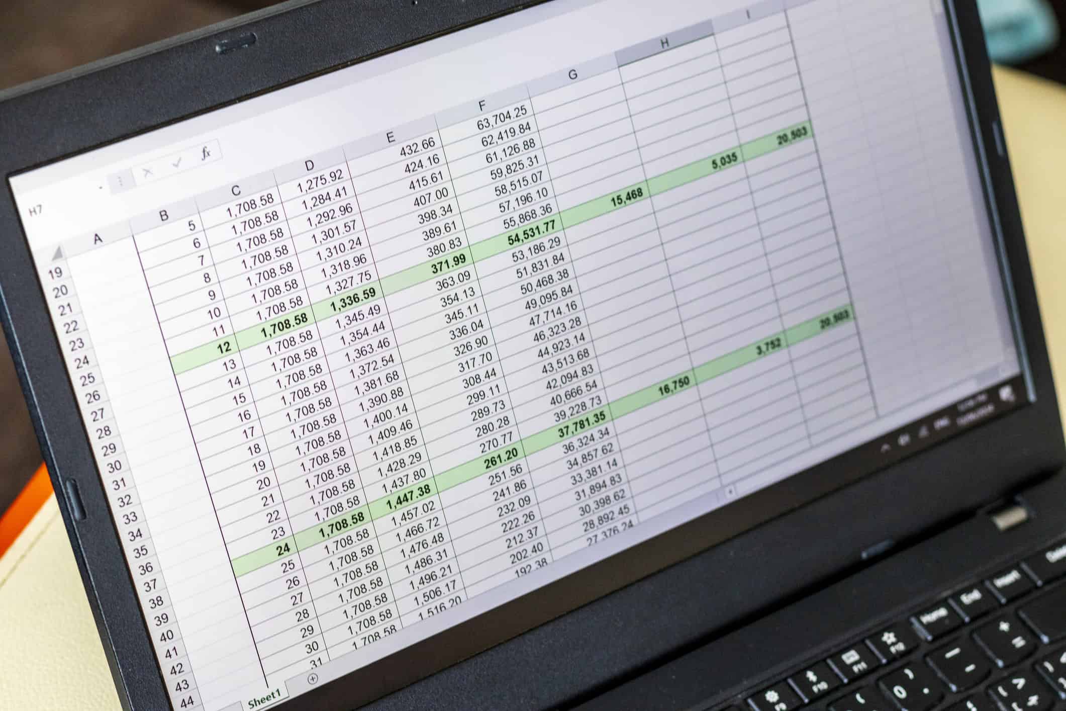 A spreadsheet of numbers on a laptop screen